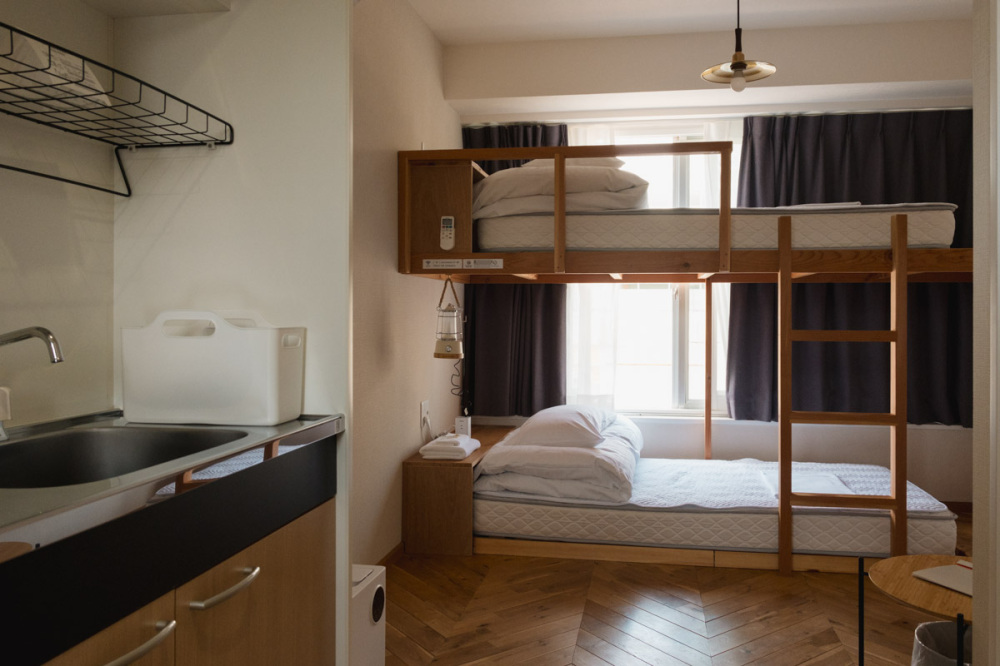The total 8 guestrooms are furnished with bunk beds and a kitchenette, and some also with a wall bike rack.