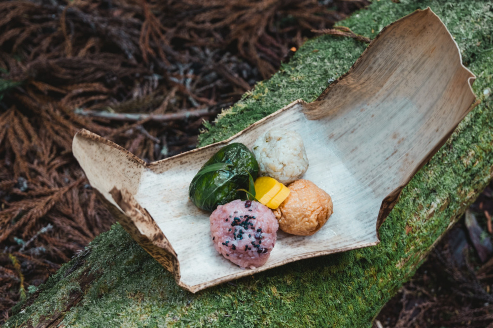 Mehari-zushi—rice balls wrapped in salt-cured takana—is a local specialty of the Kumano region. It’s perfect for a hike along the Kumano Kodo.