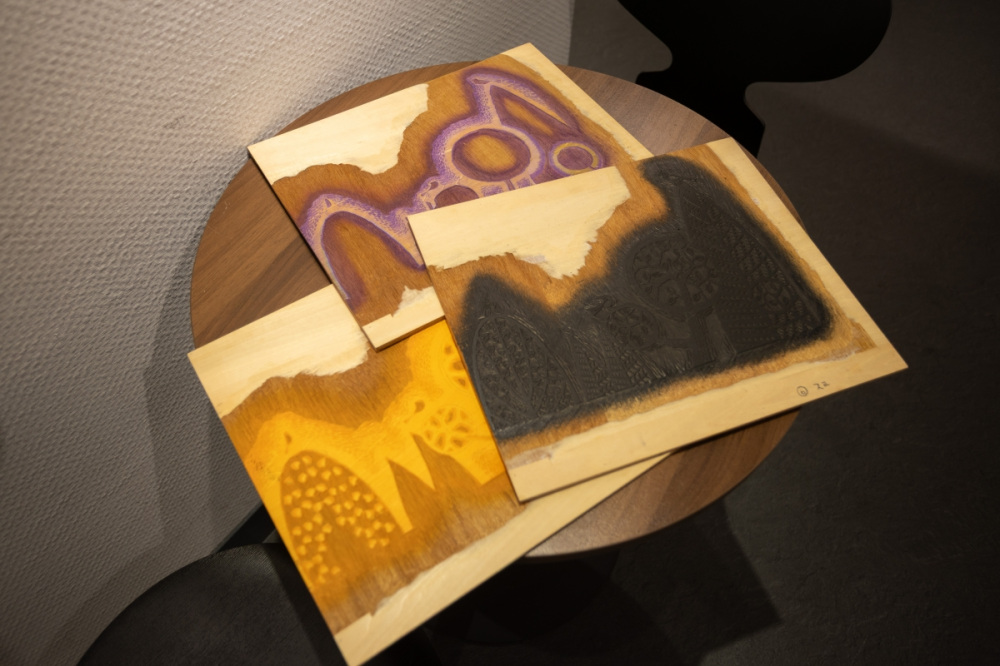The woodblocks used for Kyuki’s prints. A separate block is carved for each color, then the colors are layered to complete a single print.